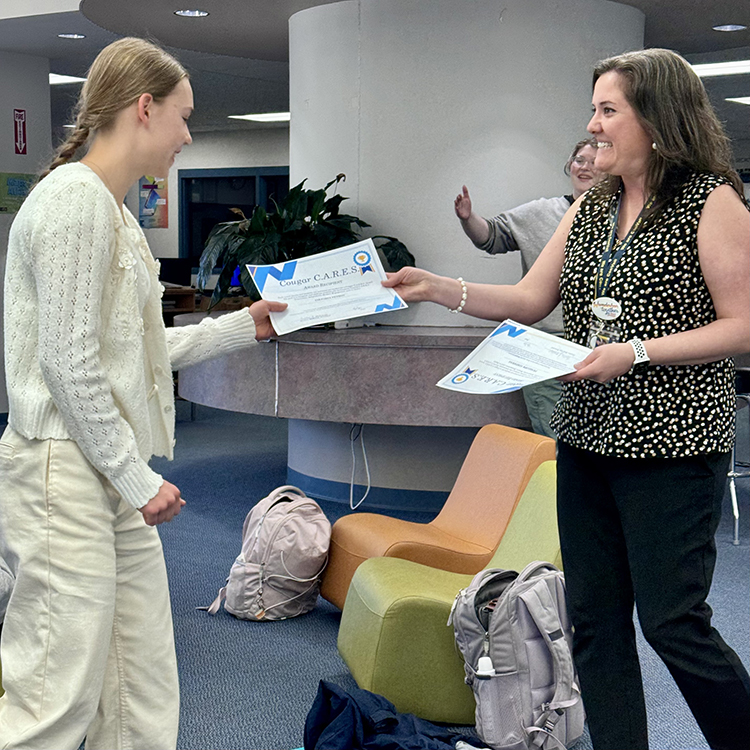 Student receives a Cougar CARES award